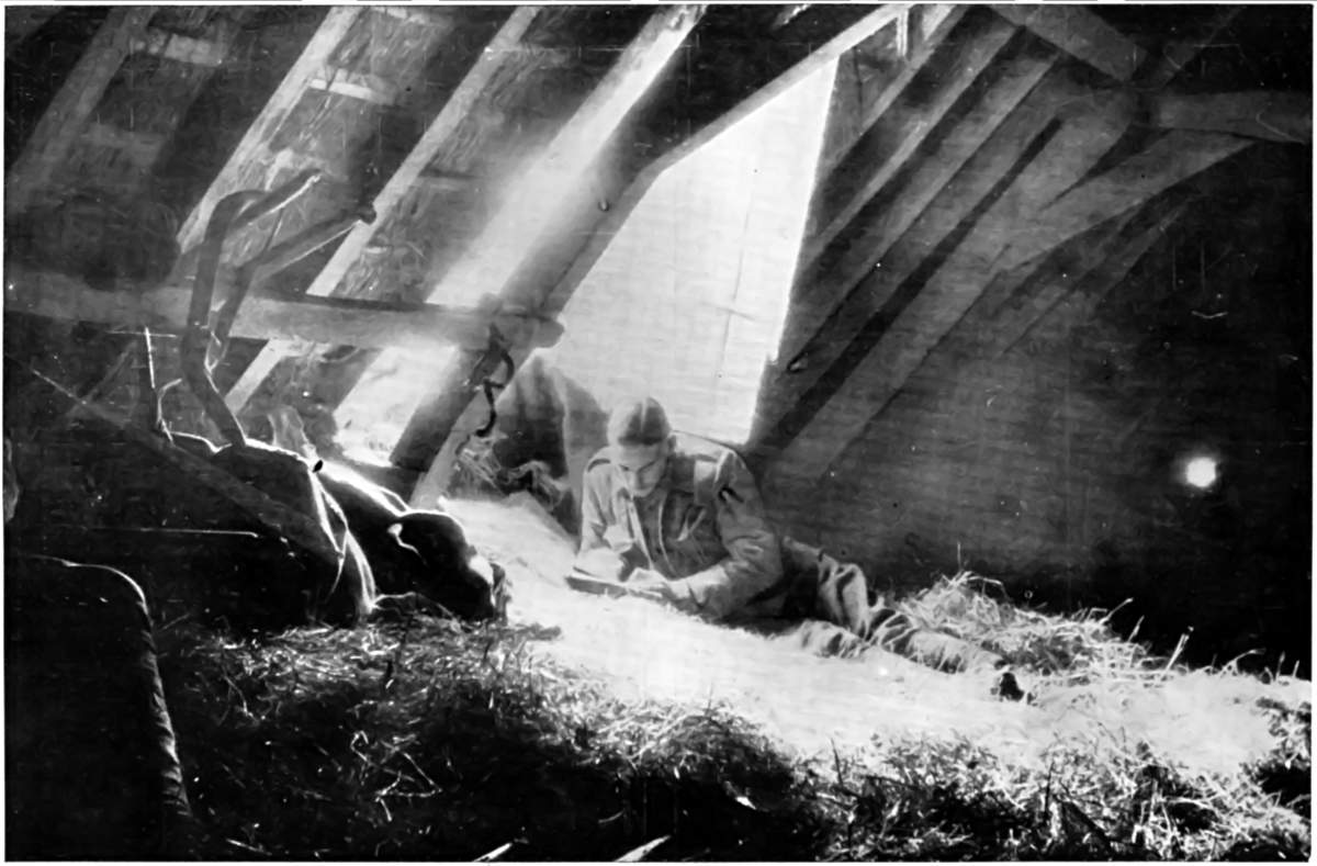 THE LETTER HOME: A BRITISH SOLDIER WRITING IN A LOFT OVER A COW-SHED "SOMEWHERE NEAR THE FRONT."