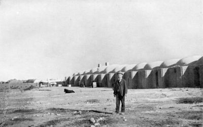 The Customs Caravanserai, Sher-i-Nasrya, Sistan. (Belgian Customs Officer in foreground.)