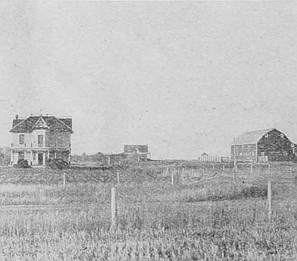 Beginning a home in the prairie—house and table "lands" are built on cement foundation.