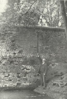 Plate V.—The Inner Side of the Prison Wall as it now
Stands